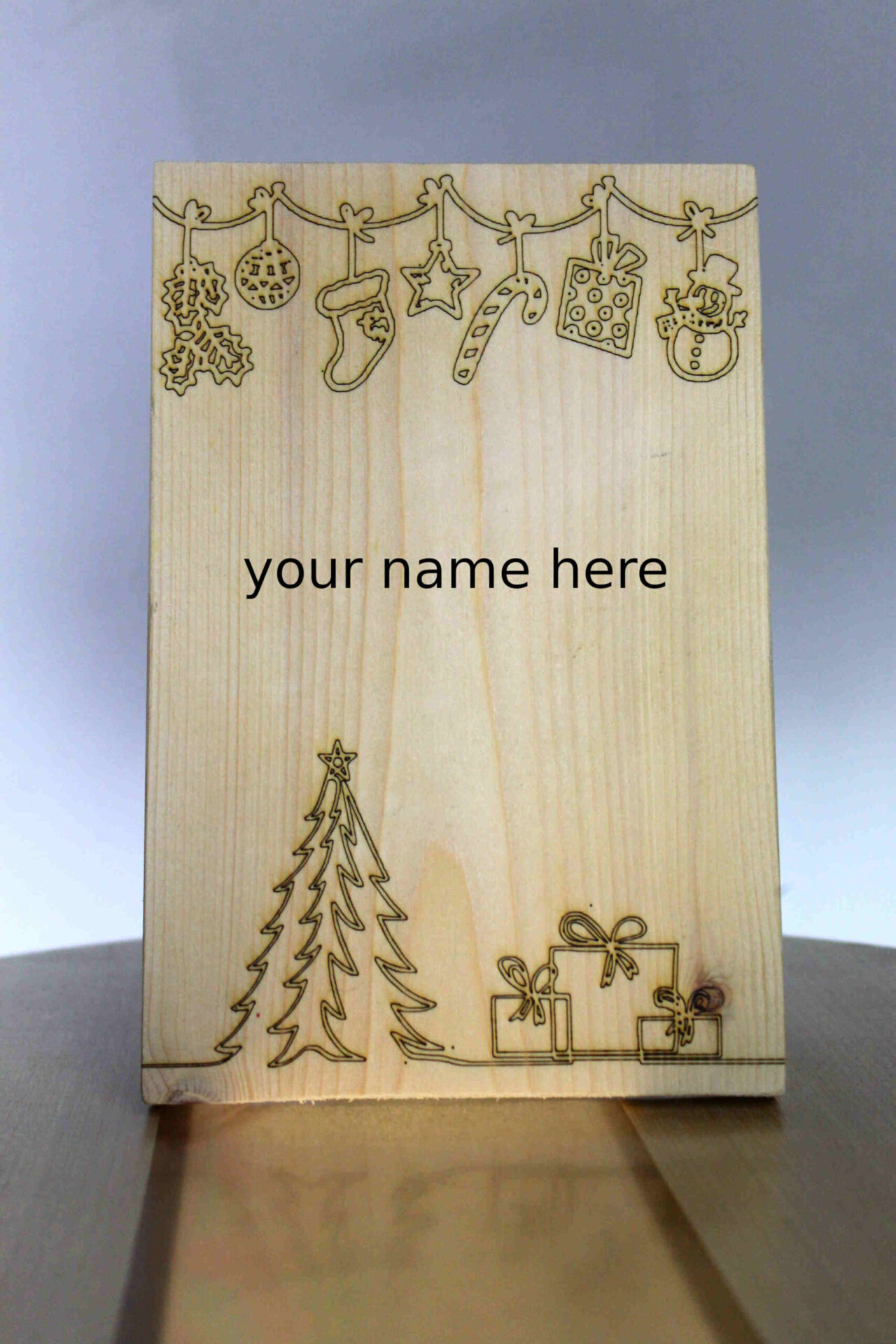 Houten kerstkaart - 'in case of emergency'